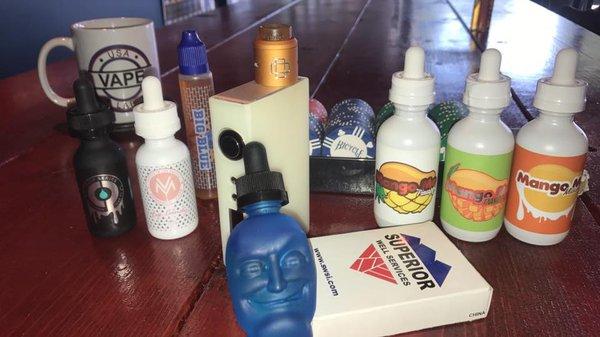 A nice pic of some of the juice we are considering to carry in the near future. EXCEPT we already carry the Little Head Vapor Juice!