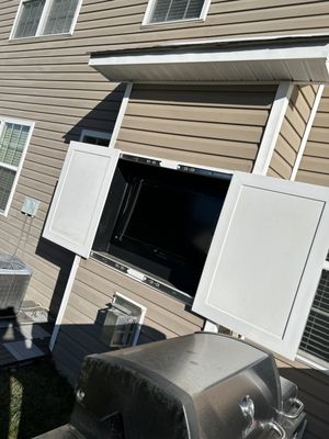 outdoor tv insert with sliding poly cabinet doors