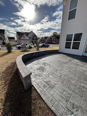 Stamped  Concrete Patio w/ 3 ft high Retaining  Wall