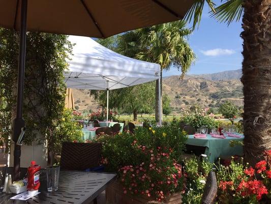 Perfect weather, lovely scenery, and oodles of tables awaiting afternoon guests.