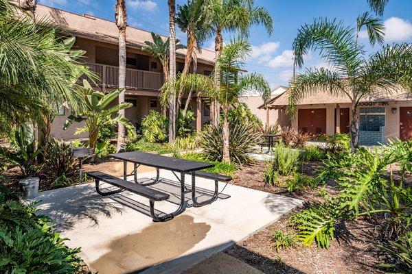 Bench in the courtyard at Bay Breeze Apartment complex