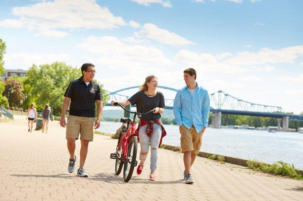 UW-La Crosse students walk near the Mississippi River in downtown La Crosse.