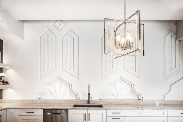 The deco wall is one of our favorite things about this kitchen we designed and remodeled.