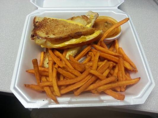 Parmesan encrusted four cheese grilled cheese, tomato dipper and sweet potato fries