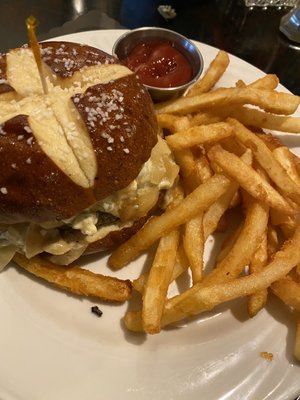 Whiskey blue burger on pretzel bun