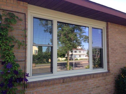 Installed Restorations picture window flanked by tilt-in double hung windows in Gilbert, MN.