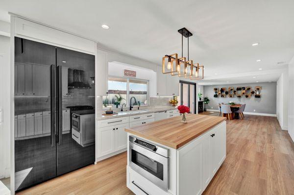 Gourmet kitchen flows effortlessly into the dining room!