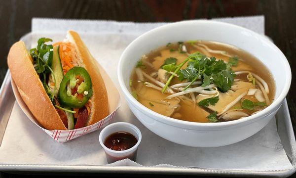 Pick 2 options: Half banh-mi Sandwich and half pho pictured here.