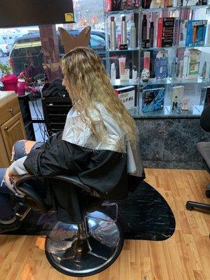 With her hair wet after completely blond. Not what she asked for.