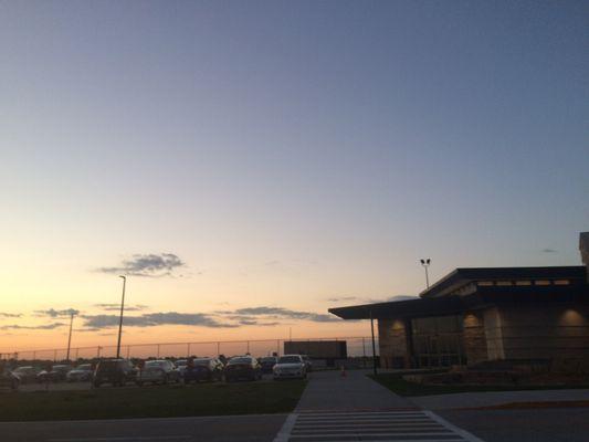 Sunset and rental cars at the airport.