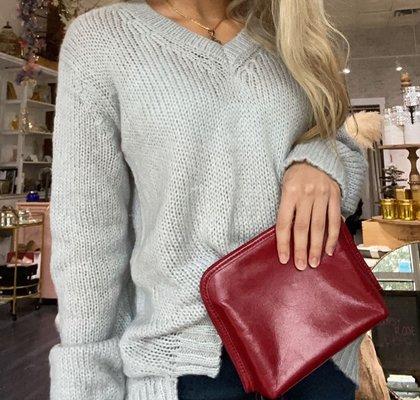 Stunning 'Wooden Ships' sweater and handmade leather beauty bag by 'Hobo'.