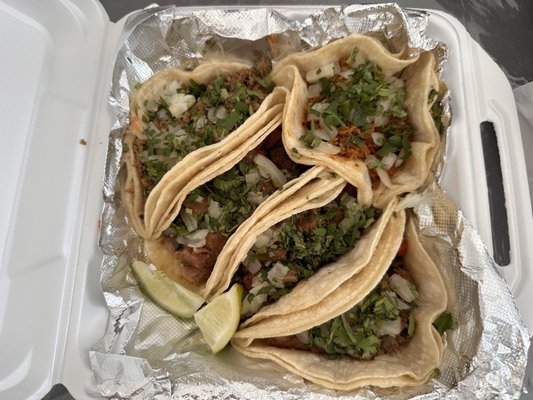 Lengua, carnita, and ground beef tacos