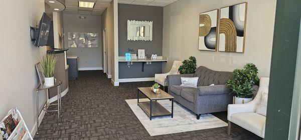 Waiting room with Coffee station, reading material and Water