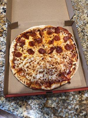 Large pepperoni and cheese pizza