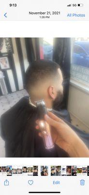 Low fade with low buzz on top