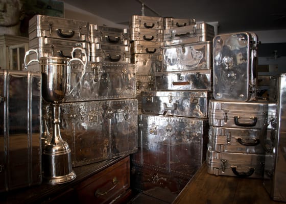 A wonderful collection of polished vintage aluminum trunks.