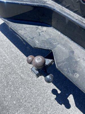 When I first installed my ball for the trailer it was about 1/4" from the bumper so I had to trim the bumper !!