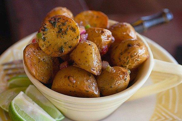 Sonoran spicy style roasted baby potato salad with serrano chile and pickled red onion, tossed with a chili-lime vinaigrette.