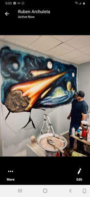 El Paso native artist Ruben Archuleta has created a memorable Asteroid mural commissioned for AIC Supplements store titled "Atomic Strength"