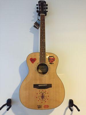 The Edgar Alan Poe Elementary guitar donation.