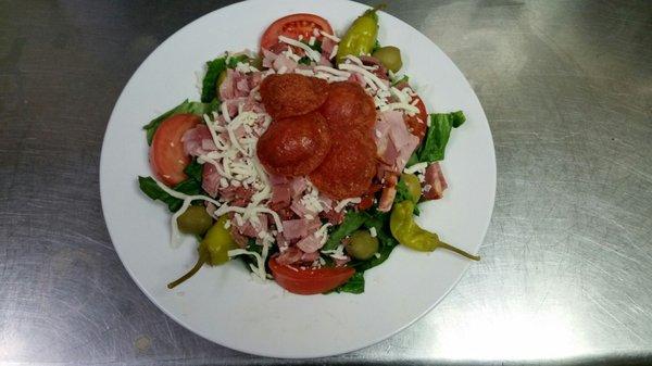 Fresh antipasto salad loaded with meaty and cheese!