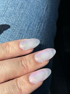 Unicorn chrome. One finger has cat eye underneath