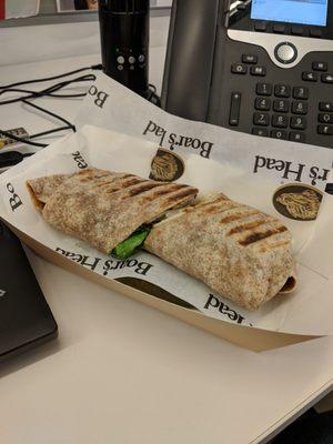 The Blazing Buffalo wrap. Cajun Chicken deli meat, lettuce, bacon, special sauce, on a wheat wrap then put in a panini press.