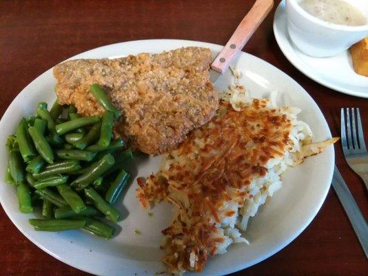 Sally's Restaurant's Chicken Fried Steak with Green Beans, Choice of Potato, Country gravy and Hot Texas Toast.  Also includes dessert.