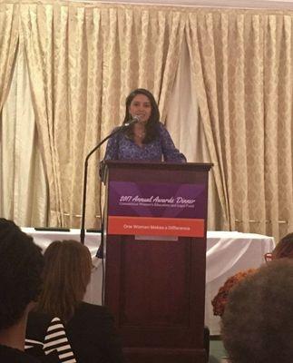 Our attorney accepting the "One Woman Makes a difference" award from the Connecticut Women's Education and Legal Fund