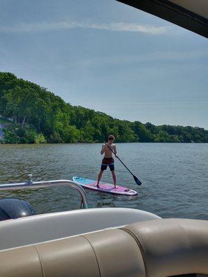 Stand up paddle boarding... my son already knew how to do it