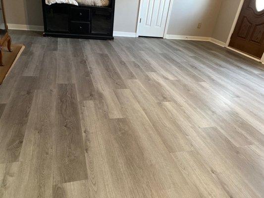 New floors throughout house and sunroom.