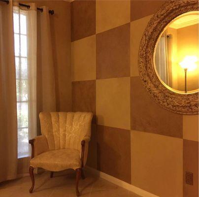 This is a Faux Finish technique, Glazed blocks color washed over this Formal room.