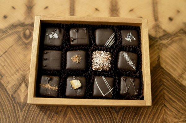 Artisan truffle collection in handmade wooden box