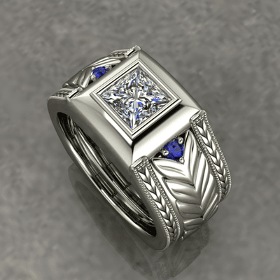 Gents princesss and round sapphire ring.