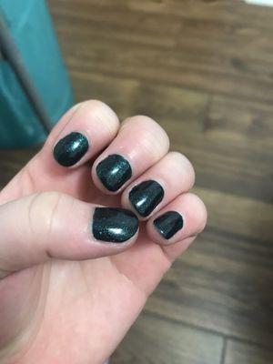 Dark green, sparkly gel polish