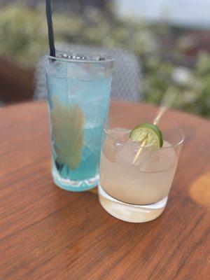 Mezcal beverage (blue) and tequila + a splash of grapefruit