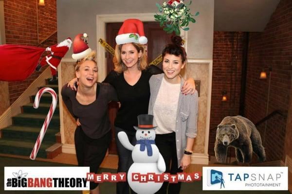 Kaley Cuoco, star of The Big Bang Theory, enjoys TapSnap at the show's cast and crew holiday party.