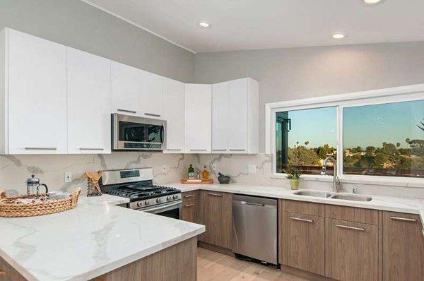 Frameless European style mix color +calacatta white  countertop + full calacatta white quartz backsplash