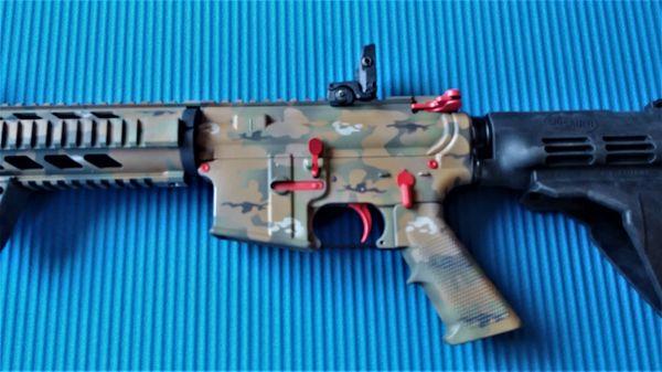 Cerakote camo with orange accents