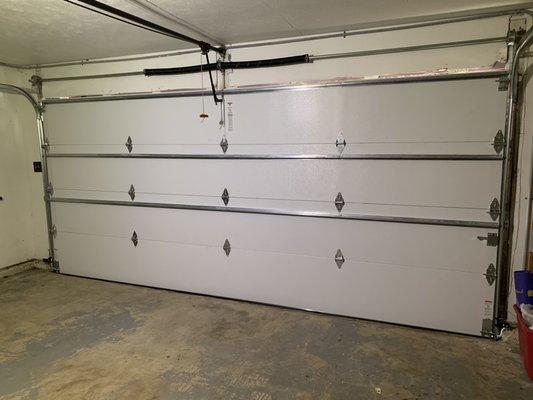 Inside picture of a brand new CHI steel back insulated door! Keep the weather out in your garage feeling amazing!