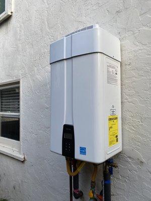 New exterior tankless heater installed by kato plumbing