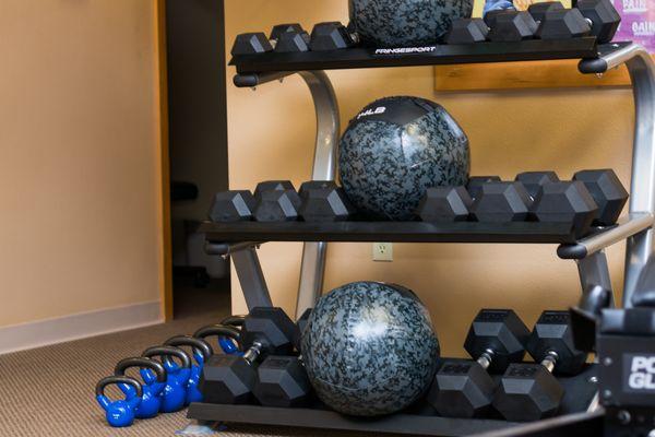 Kettlebells, dumbbells and medicine balls of varying weight