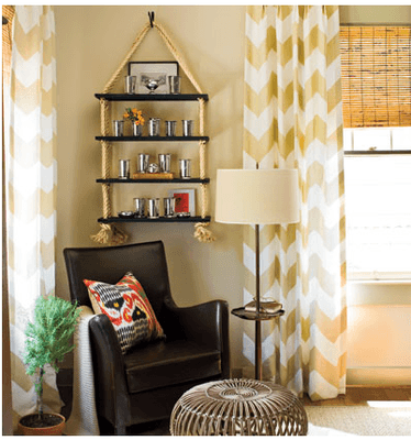 Yellow and white chevron stationary panels w/ bamboo shade underneath gives a warm casual feeling to the room.