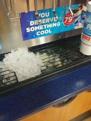 Old cups left behind and ice everywhere but no ice in the machine