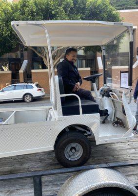 Hector with Telegraph Landing North so happy to have a working cart for trash pick up.