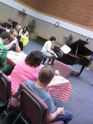 Adult students from Calliope Music Studios enjoy pot luck recitals!