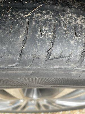 Passenger front tire cut near end of tread - REPLACE