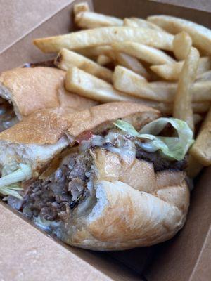 Beef cheese steak and fries