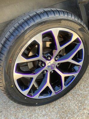 Custom blue and purple accents on wheels