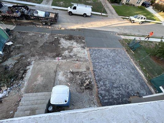 Paver driveway and a concrete city approach/ sidewalk